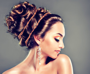 Model with Coral makeup and Greek Hairstyles