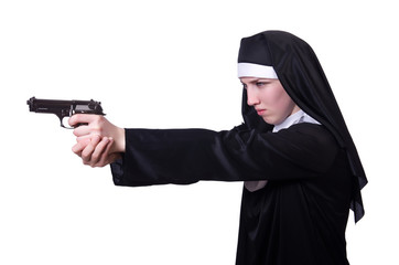 Nun with handgun isolated on white