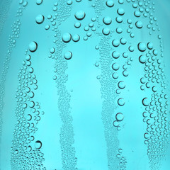 Naklejka na ściany i meble Drops of water on the glass