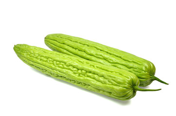 Two bitter melon on white background