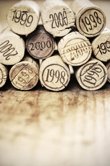 Vintage corks on wood, copyspace