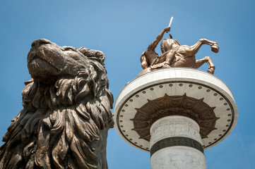 New statue of Alexander the Great with statue of lion in front o