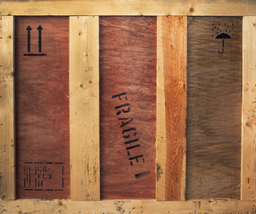 Wooden box with fragile and freight signs