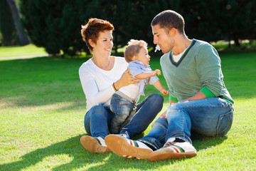 Family playing on grass