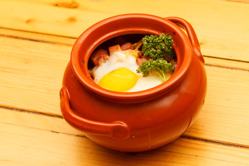 meat with egg in the pot