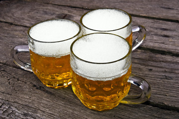 beer on wood background