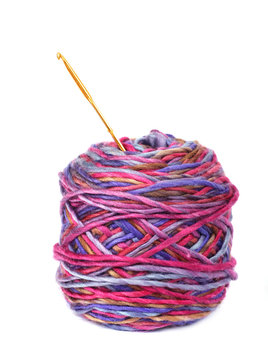 Colorful yarn  ball with crochet on white background