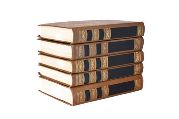A stack of books lying on a white background