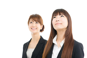 Fototapeta na wymiar Beautiful asian businesswomen isolated on white background