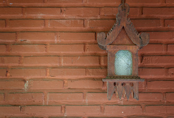 Lamp on a brick wall
