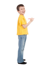 boy in yellow t-shirt writes marker
