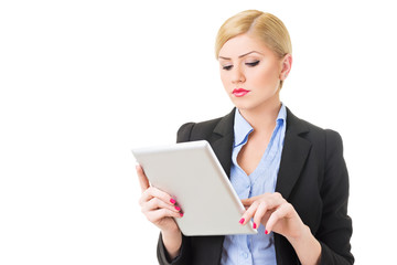 Businesswoman reading on tablet computer