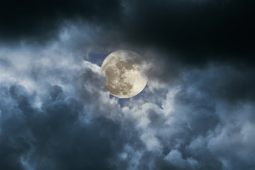 Full moon in a cloudy night