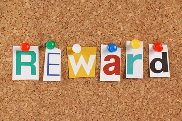 The word Reward in cut out magazine letters