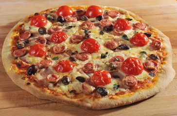 Peperoni Pizza with cherry tomatoes and olives