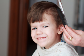 Kid with teeth smile haircut