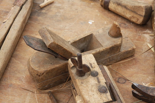 old wooden and iron Planer for the manufacture of wooden planks