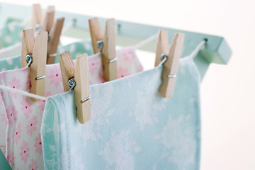 Laundry drying with wooden clothespins