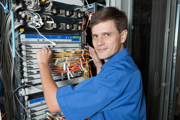 Network engineer in server room
