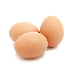 Three eggs on white background