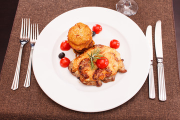 meat with potato pancakes