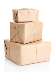 parcels boxes with kraft paper, isolated on white