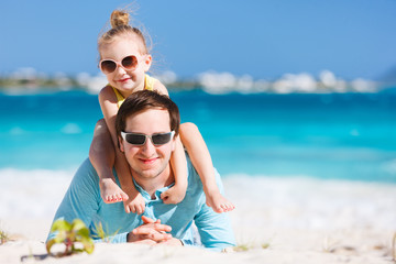 Father and daughter at beach