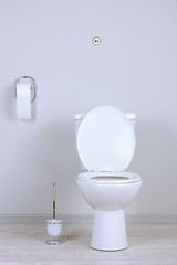 White toilet bowl in a bathroom