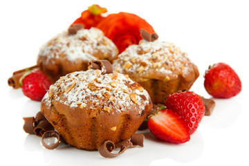 Tasty muffin cakes with strawberries and chocolate, isolated