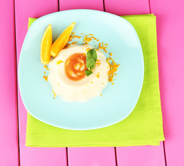 Panna Cotta with orange zest and caramel sauce,