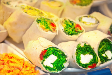 Rolls with cream cheeze and shrimp salad on fastfood counter