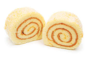 Fototapeta premium two pieces of sponge cakes on white