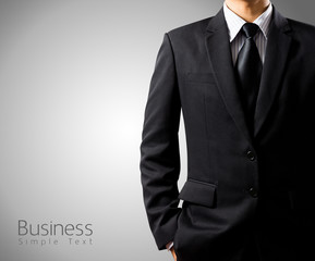 businessman in suit on gray background