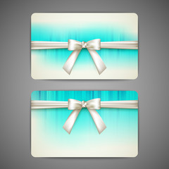 gift cards with white bows and ribbons