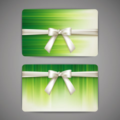 green gift cards with white bows and ribbons