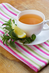 Cup of tea on wooden table