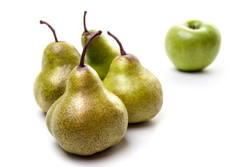 Pears and an apple on white