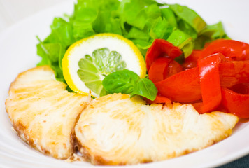 white fish fillet with vegetables