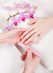 Obraz na płótnie Canvas Profesjonalny paznokci technik z manicure z kobieta