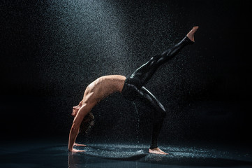 Male dancer under rain