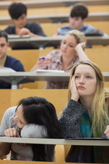 Bored students sitting in a lecture hall