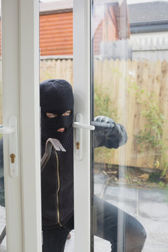 Burglar Opening The Terrace Door