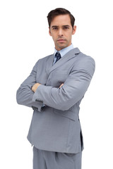 Serious businessman looking at camera