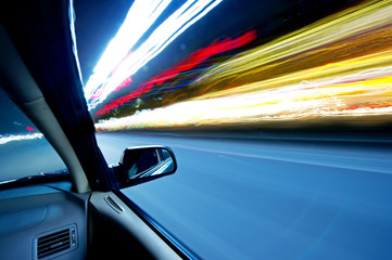 car on the road with motion blur background.