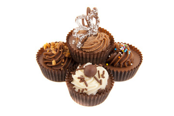 chocolate cupcakes, isolated on white