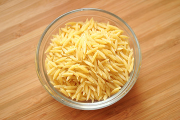 Risoni Pasta in a Glass Bowl;Top View