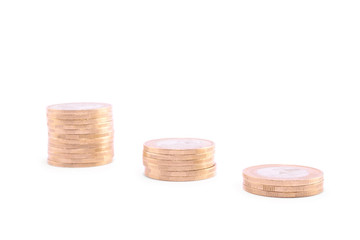 Coins towers isolated on a white