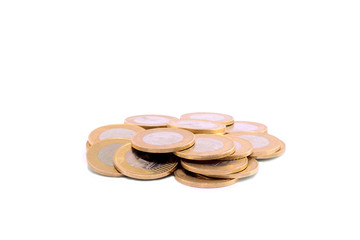 Pile of coins isolated on a white