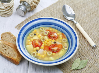 Pea soup with tomatoes and olives