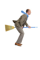 The businessman flies over air on a broom